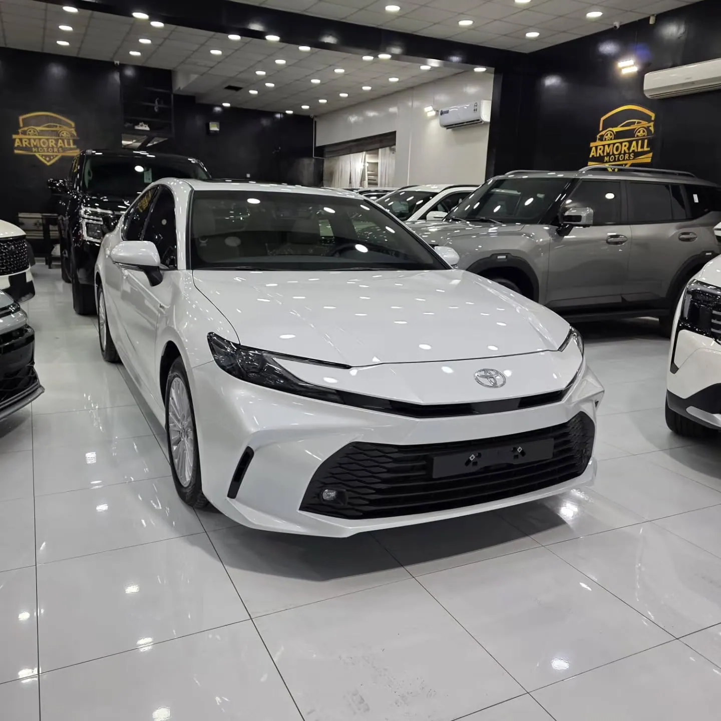 2026 Toyota Camry LE, front three-quarter view
